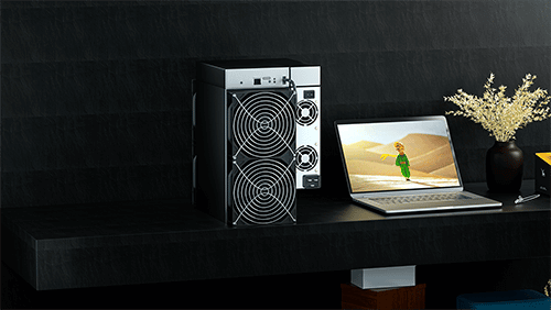 a computer tower and laptop on a desk